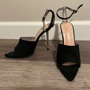 Black and gold size 8.5 heels